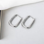 Silver Valerie O Shaped Earrings - A detailed shot showcasing the minimalist design.