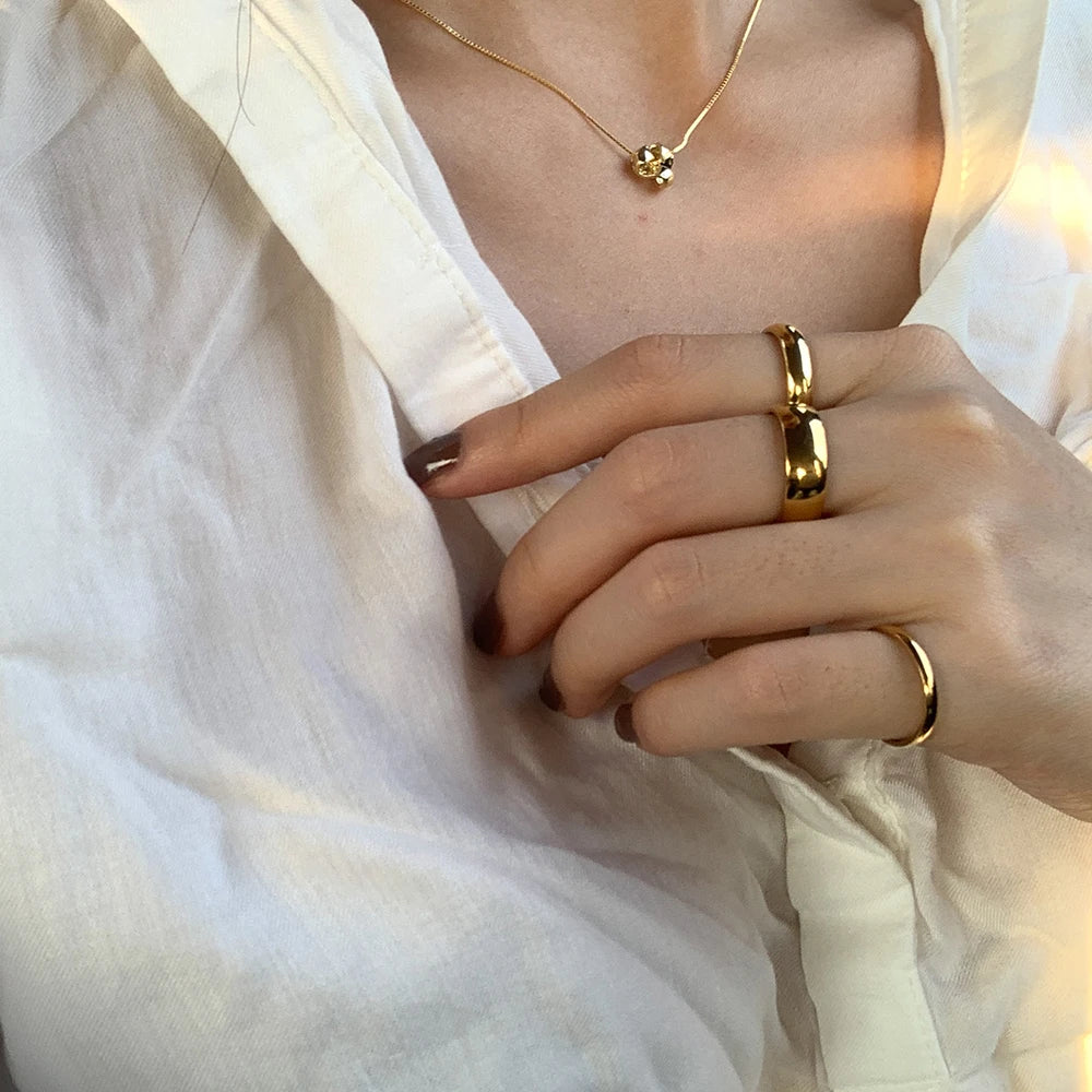 Poppy Minimal Gold Rings - A close-up view showcasing the sleek and minimalist design.