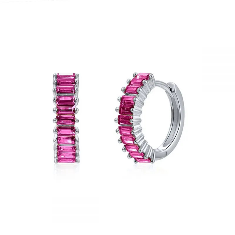 Image of Birthstone Huggies: Elegant and personalised, these huggie earrings feature birthstones, adding a touch of individuality and sophistication to your look.