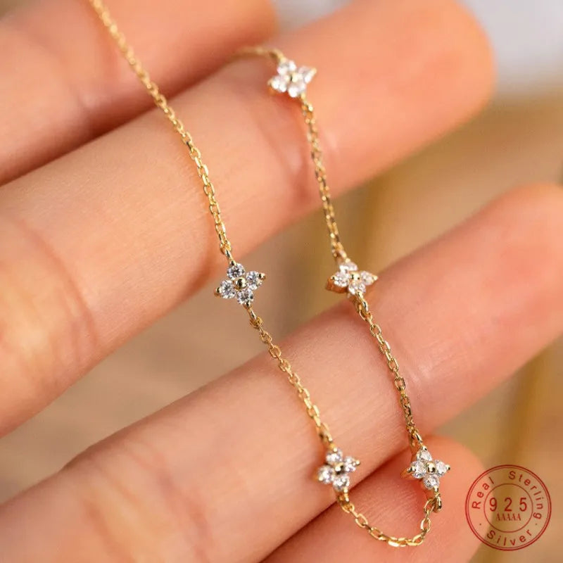 Image of Florence Flower Diamond Bracelet: A symbol of timeless elegance, this diamond bracelet features delicate flower motifs, adding a touch of sophistication and grace to your wrist.