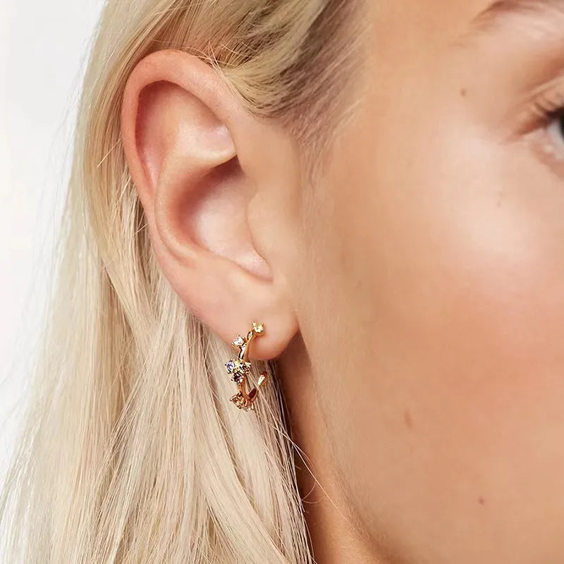 Image of Zirconia Irregular Earrings: A modern statement piece with stunning irregular zirconia stones, adding a touch of sophistication and versatility to your jewellery collection.