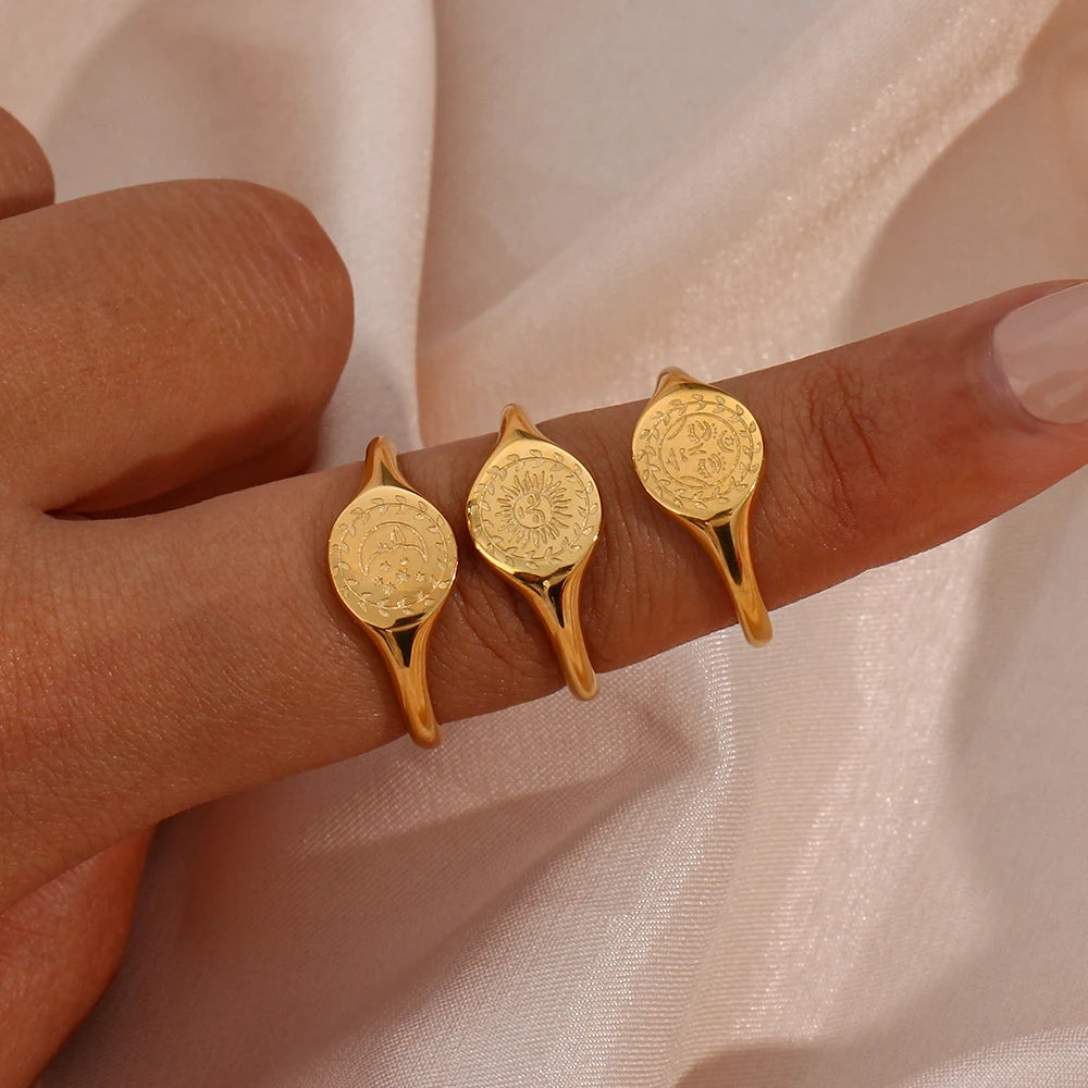 Luna Ring on Hand: Picture the Luna Signet Ring adorning your hand, adding a touch of celestial allure to your overall look, and showcasing its perfect fit for everyday wear.